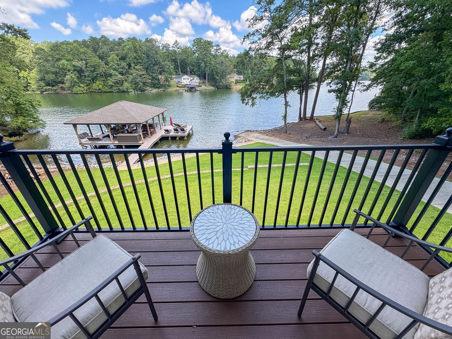 170 B Tater Hill Road Jackson, GA 30233 - Photo 26 of 74 a view of a balcony with lake view and a potted plant