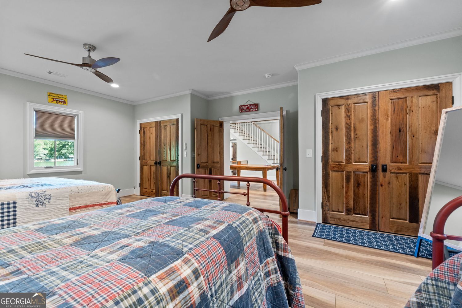 170 B Tater Hill Road Jackson, GA 30233 - Photo 51 of 74 a bedroom with a bed a dresser and a window