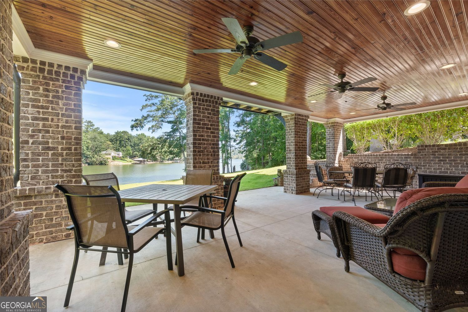 170 B Tater Hill Road Jackson, GA 30233 - Photo 52 of 74 a view of a patio with a dining table and chairs