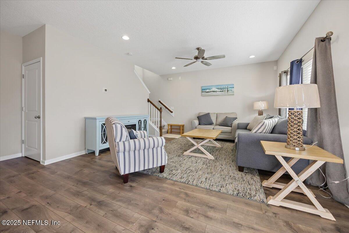 156 Clarys Run St. Augustine, FL 32092 - Photo 9 of 20 a living room with furniture and a ceiling fan
