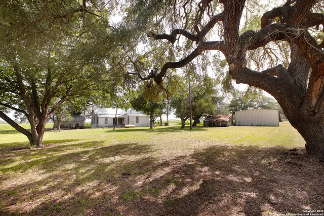 a view of swimming pool with patio