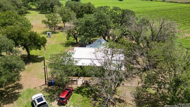 a swimming pool is sitting in the middle of a lake