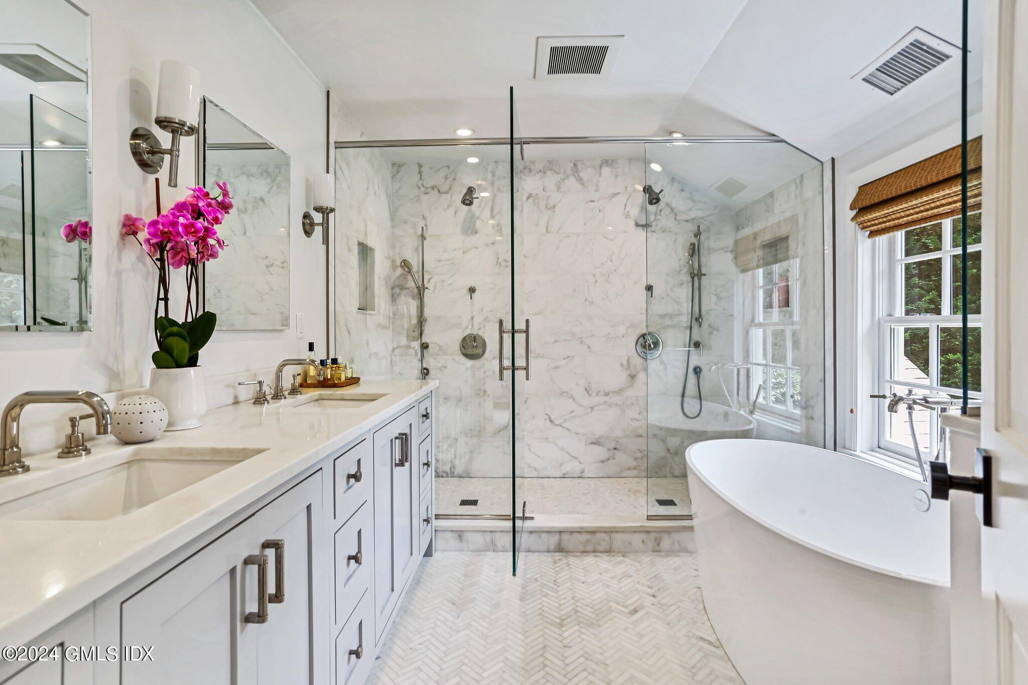 7 Wesskum Wood Road Riverside, CT 06878 - Photo 17 of 29 a bathroom with a granite countertop sink mirror and shower