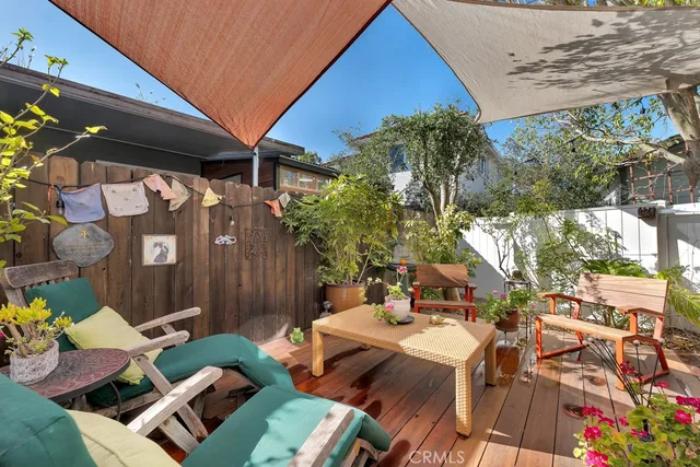 a view of yard with patio