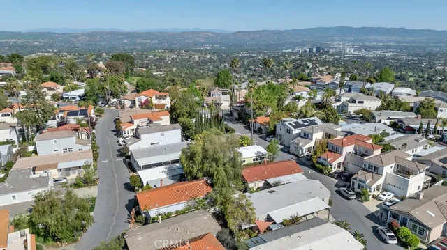 an aerial view of a city with lots of residential buildings