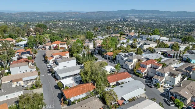 an aerial view of a city with lots of residential buildings