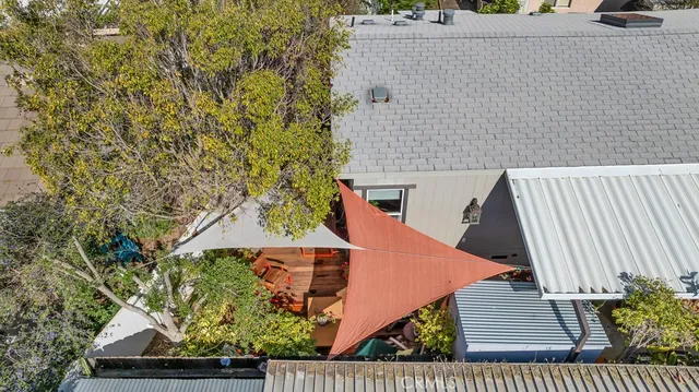 a view of balcony with wooden floor and fence
