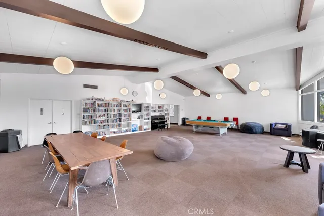 a room with furniture and a large window