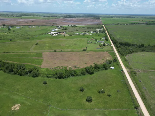 a view of a big yard with green space