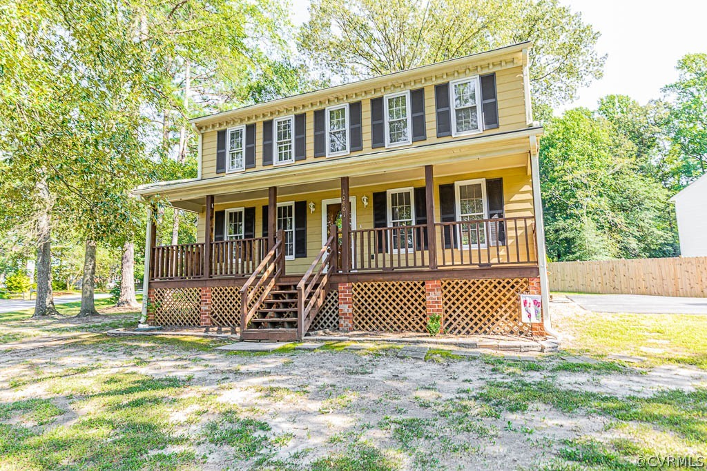 10801 Belvoir Road Chester, VA 23831 - Photo 1 of 23 a front view of a house with a yard