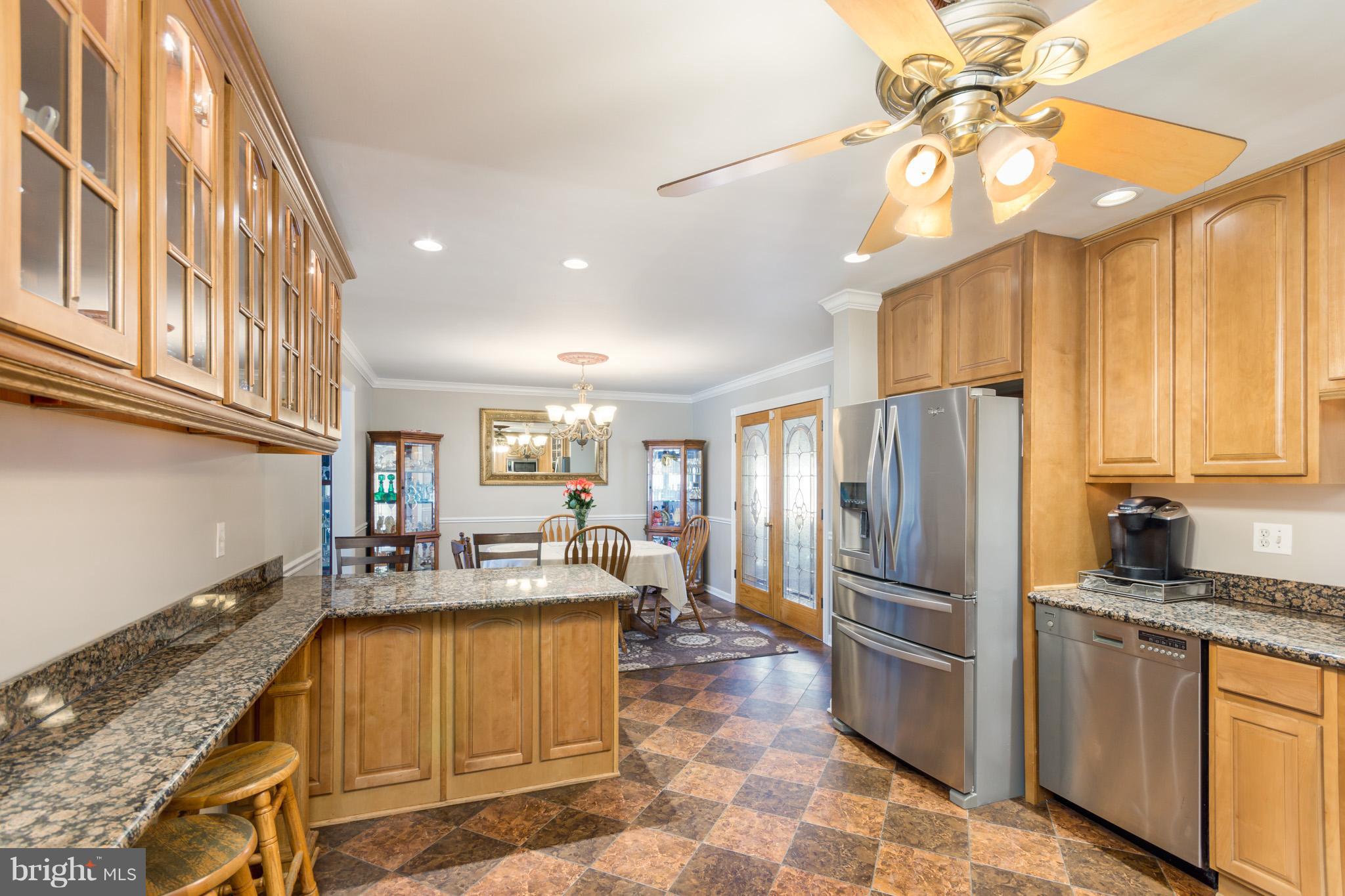1107 Green Acre Road Baltimore, MD 21286 - Photo 9 of 30 Eat in Kitchen. SS Appliances, Granite Counters