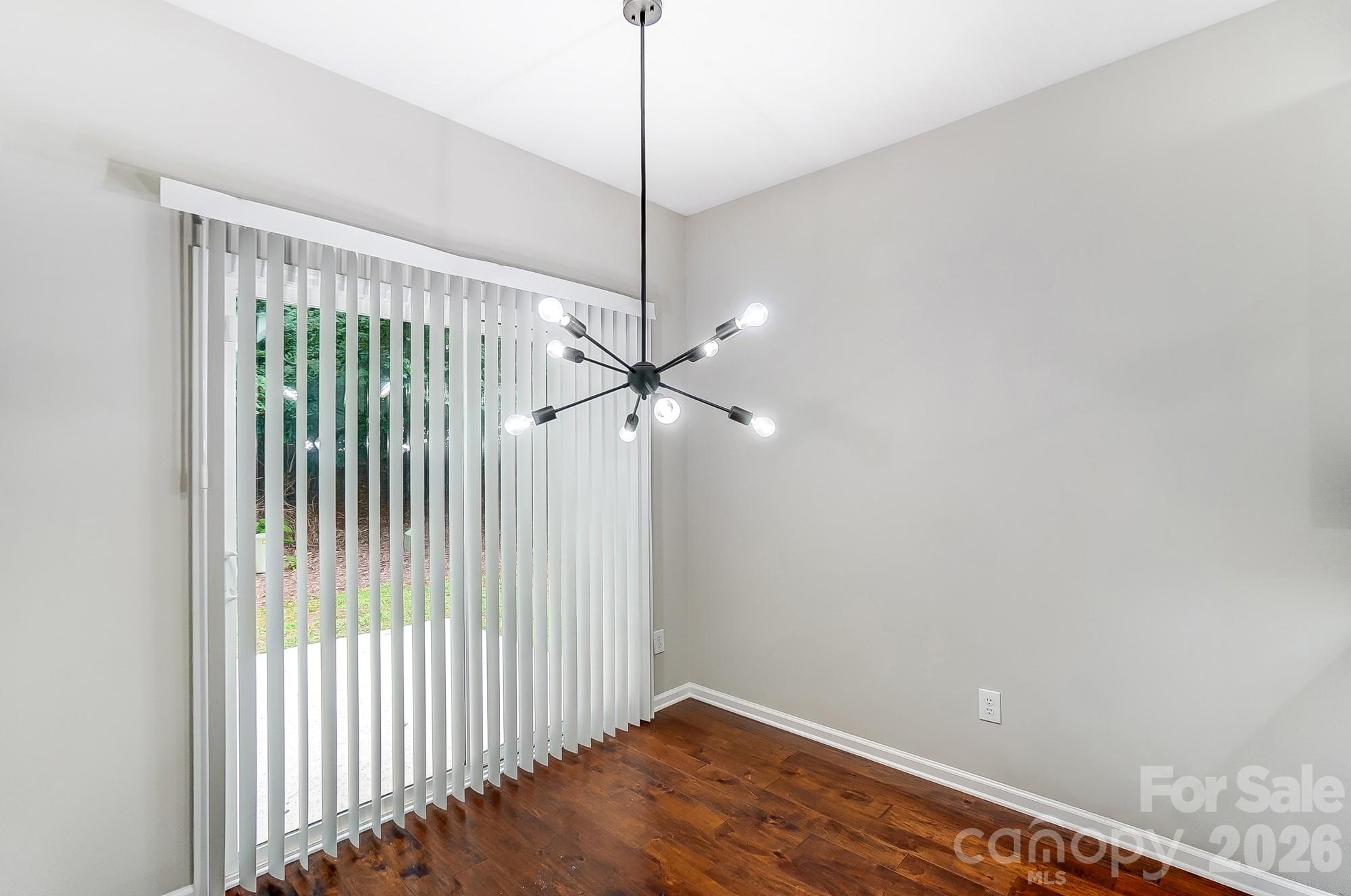 4914 Sunset Ridge Court Charlotte, NC 28269 - Photo 16 of 48 a view of a room with a ceiling fan