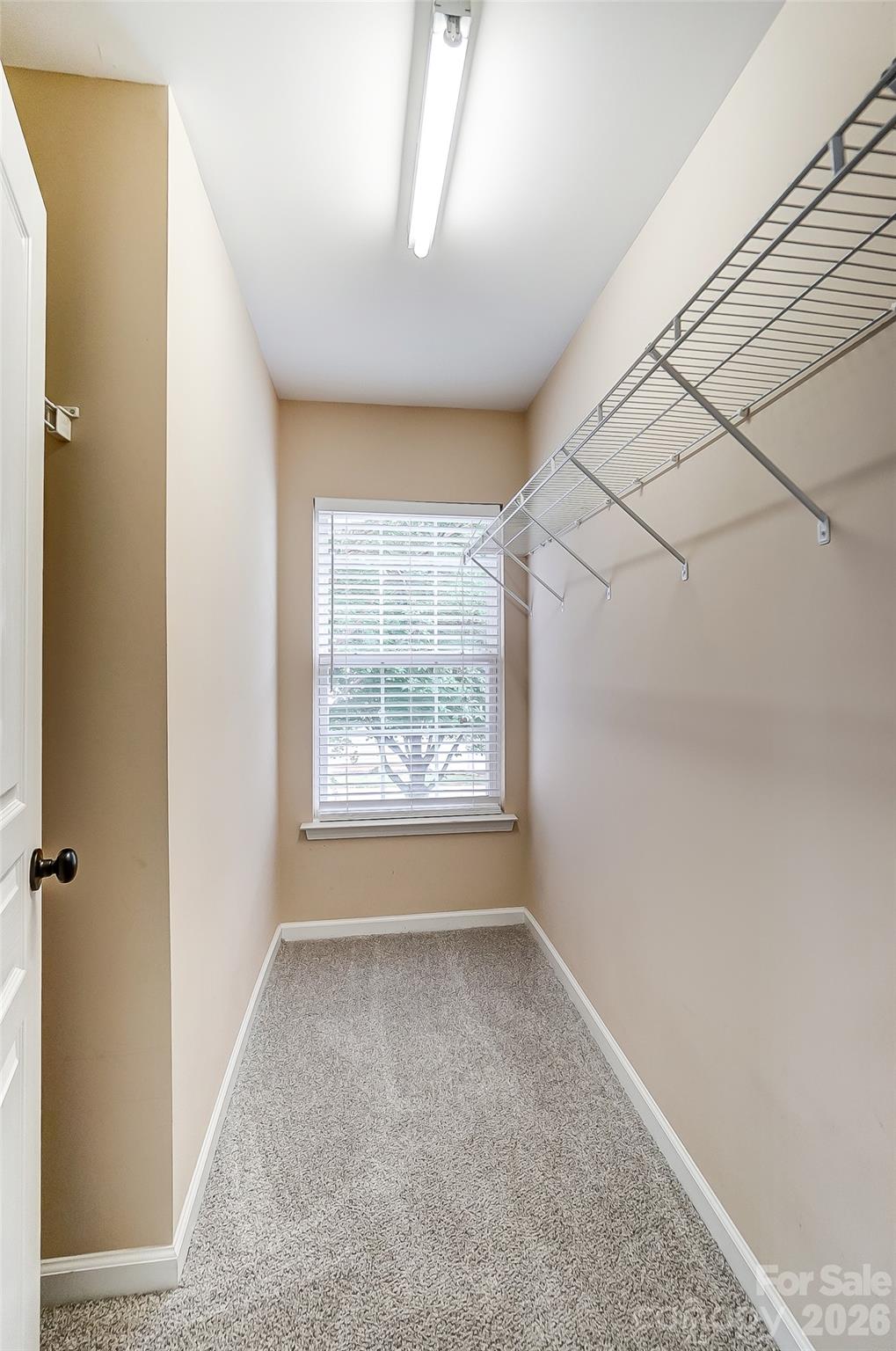 4914 Sunset Ridge Court Charlotte, NC 28269 - Photo 34 of 48 a view of an empty room with a window