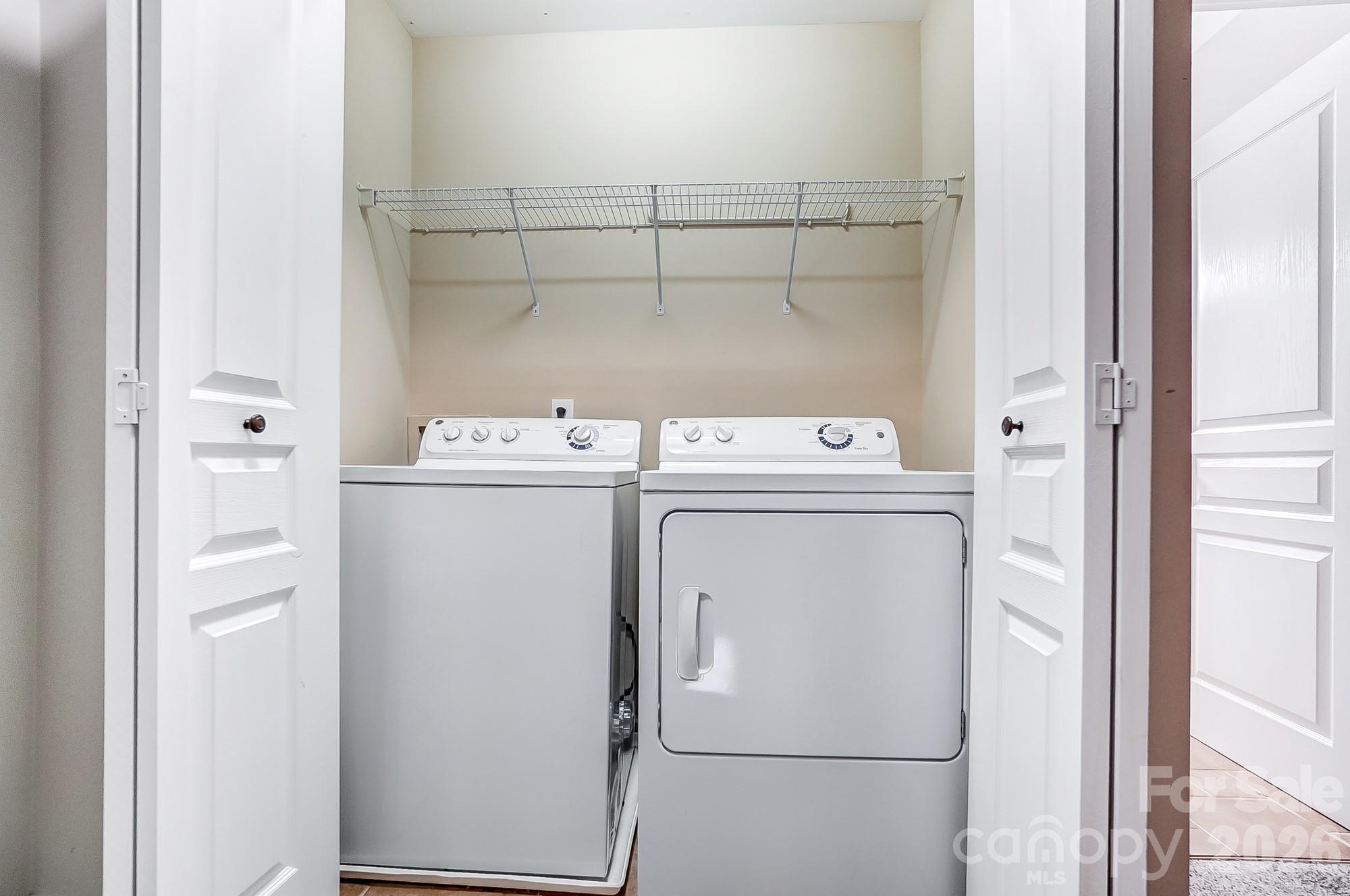 4914 Sunset Ridge Court Charlotte, NC 28269 - Photo 41 of 48 a utility room with dryer and washer