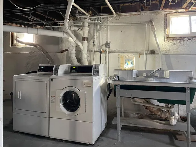 a utility room with dryer and washer