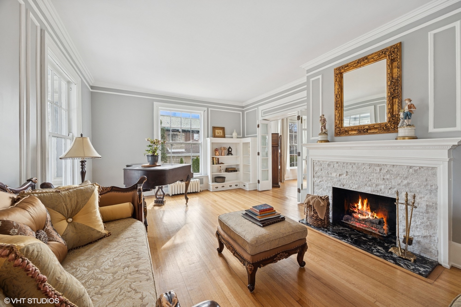 130 Michaux Road Riverside, IL 60546 - Photo 7 of 45 a living room with furniture and a fireplace