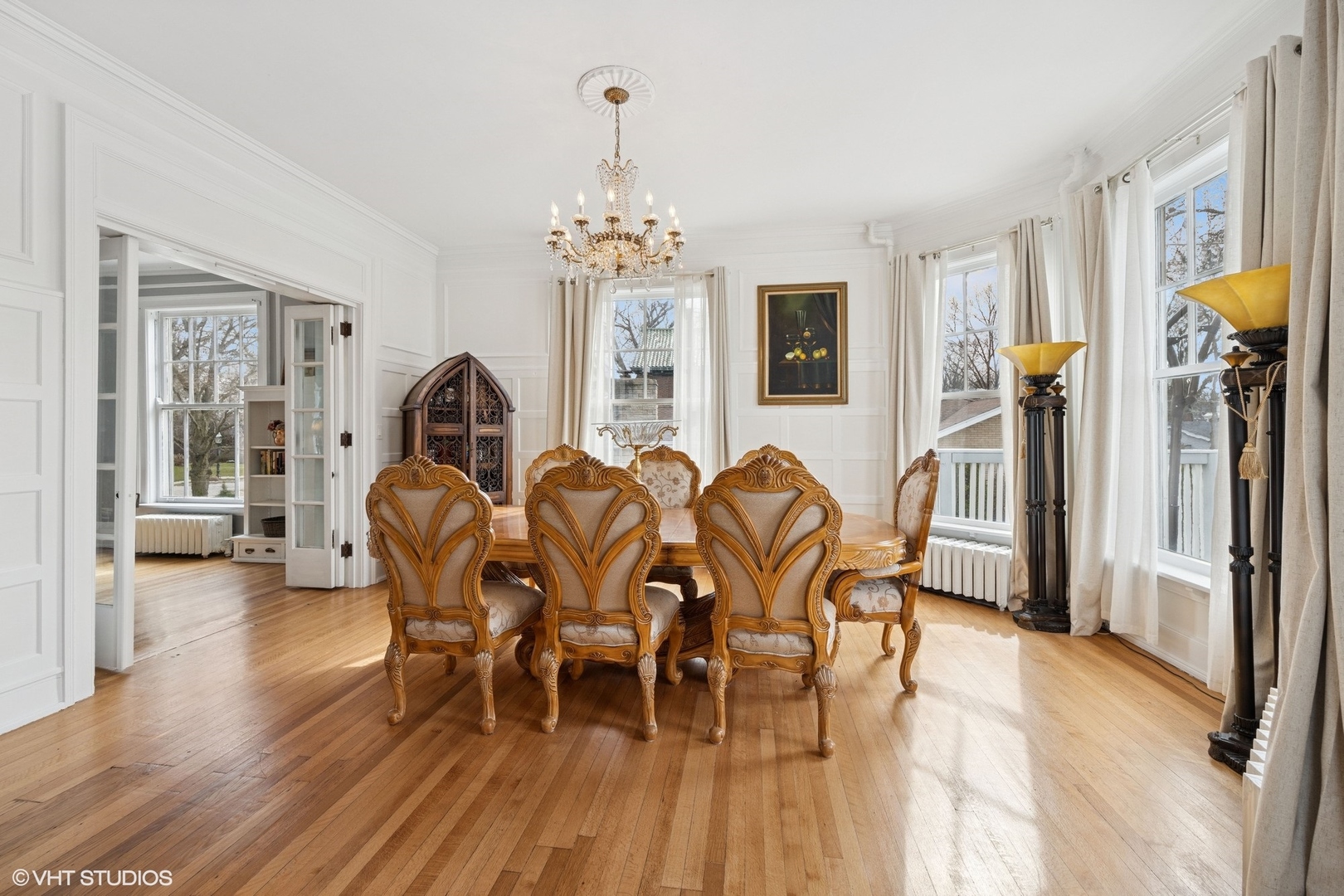 130 Michaux Road Riverside, IL 60546 - Photo 10 of 45 a view of a dining room with furniture and wooden floor