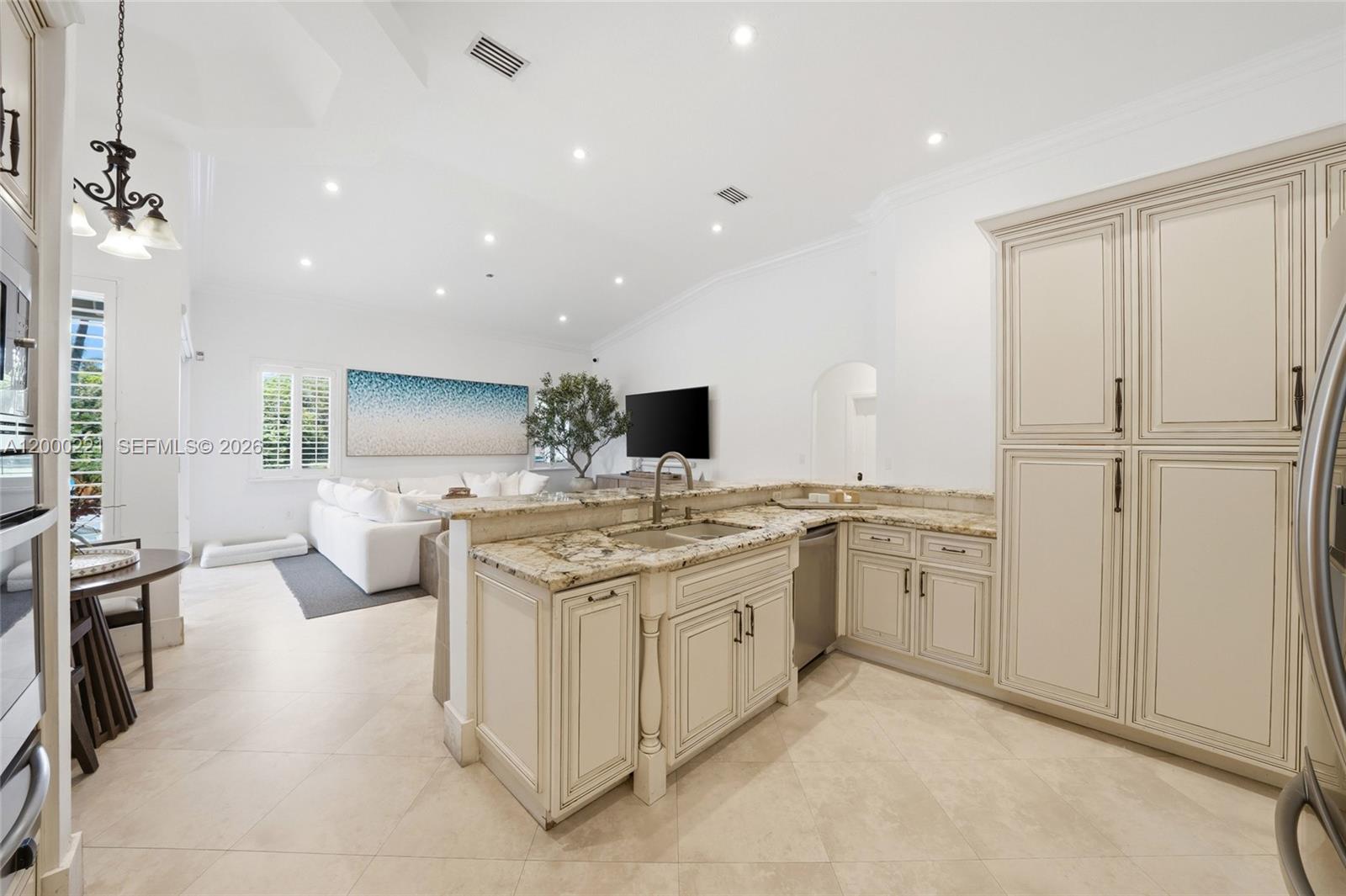 9901 Southwest 145th Street Miami, FL 33176 - Photo 16 of 78 a kitchen with counter top space and appliances