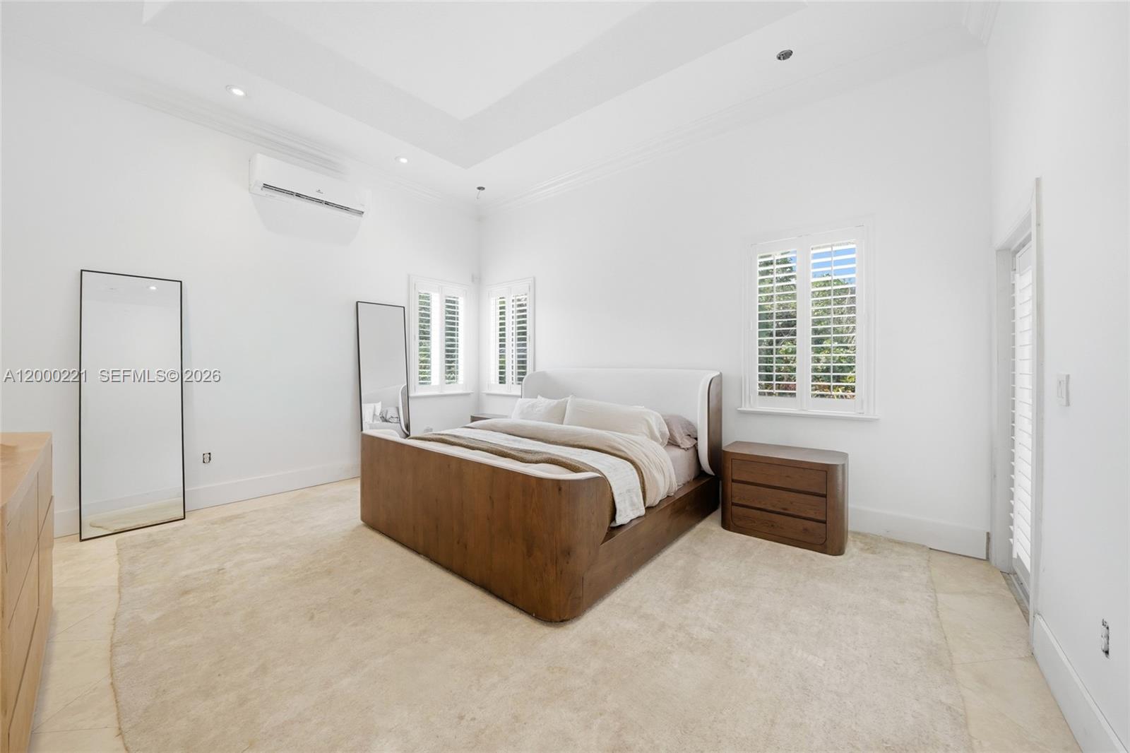 9901 Southwest 145th Street Miami, FL 33176 - Photo 24 of 78 a bed room with a bed and a window