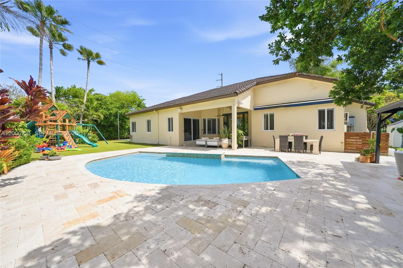 9901 Southwest 145th Street Miami, FL 33176 - Photo 45 of 78 a view of outdoor space yard and swimming pool