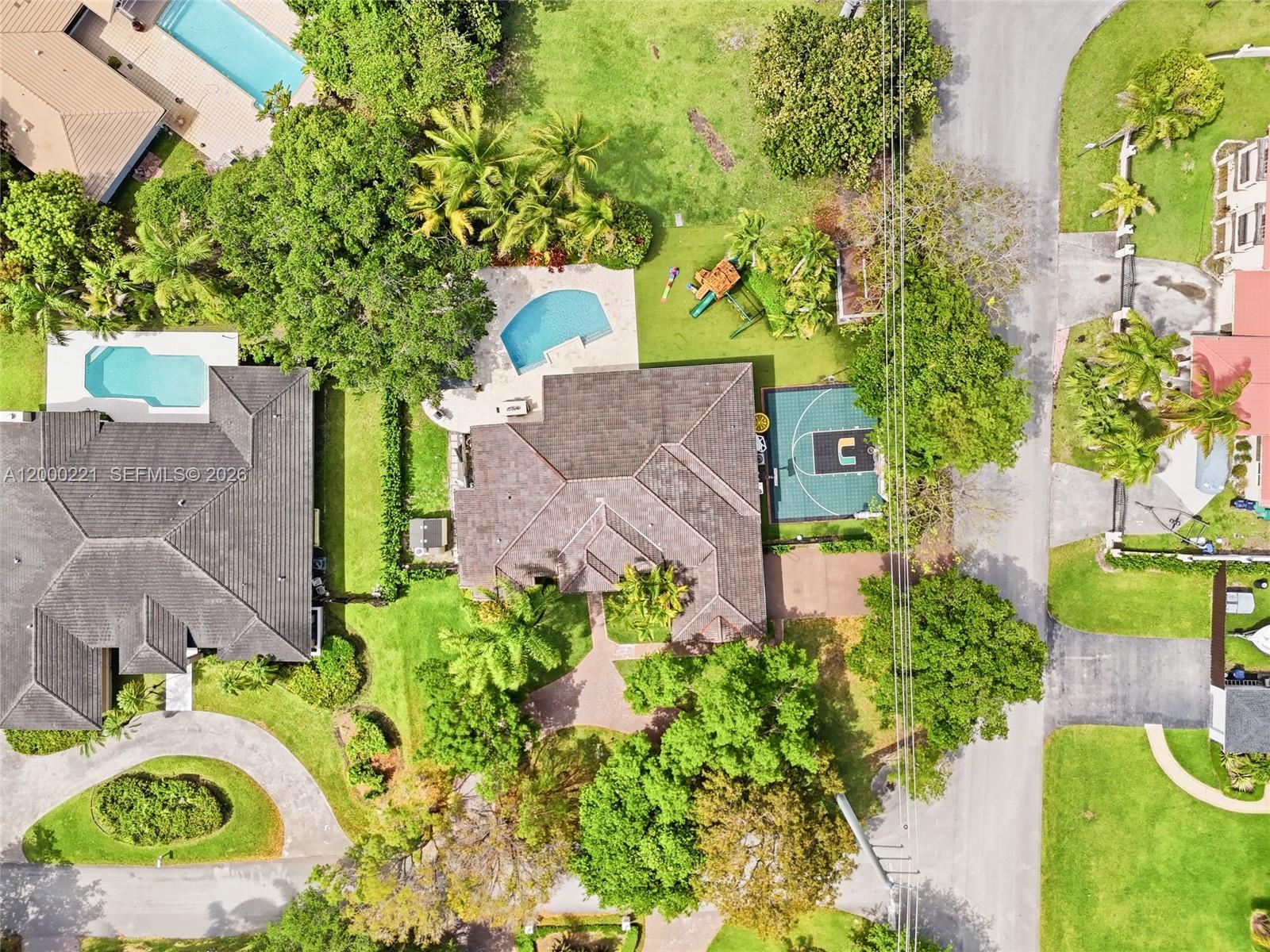 9901 Southwest 145th Street Miami, FL 33176 - Photo 46 of 78 an aerial view of a house with a yard