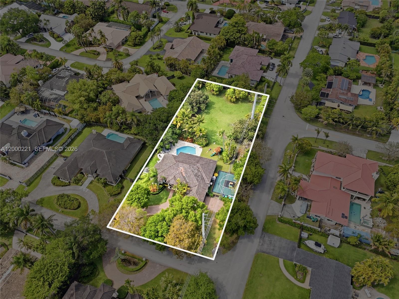 9901 Southwest 145th Street Miami, FL 33176 - Photo 59 of 78 an aerial view of a residential houses with outdoor space