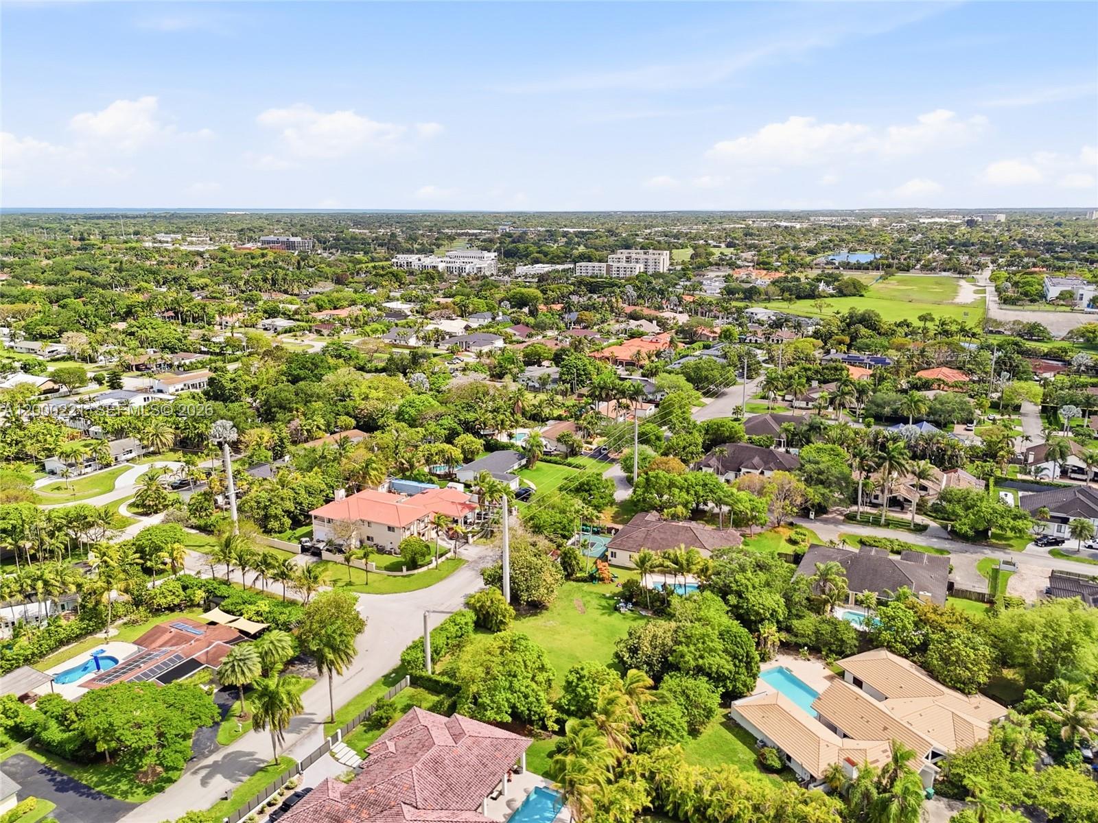 9901 Southwest 145th Street Miami, FL 33176 - Photo 66 of 78 an aerial view of residential houses with outdoor space