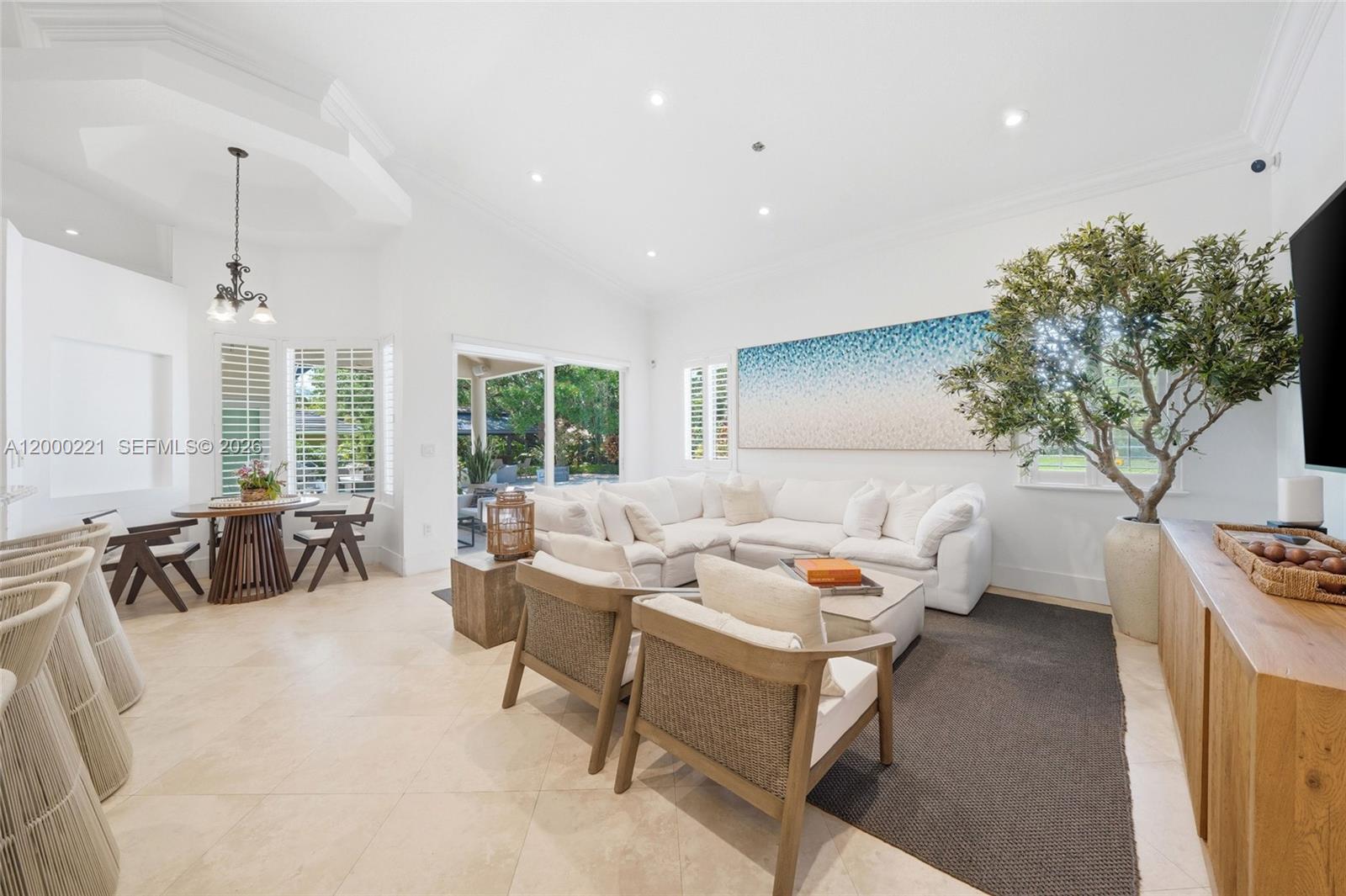 9901 Southwest 145th Street Miami, FL 33176 - Photo 10 of 78 a living room with furniture and a large window
