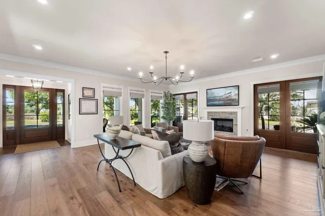 a front view of a house with a yard table and chairs