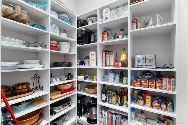 a front view of a house with a yard and porch