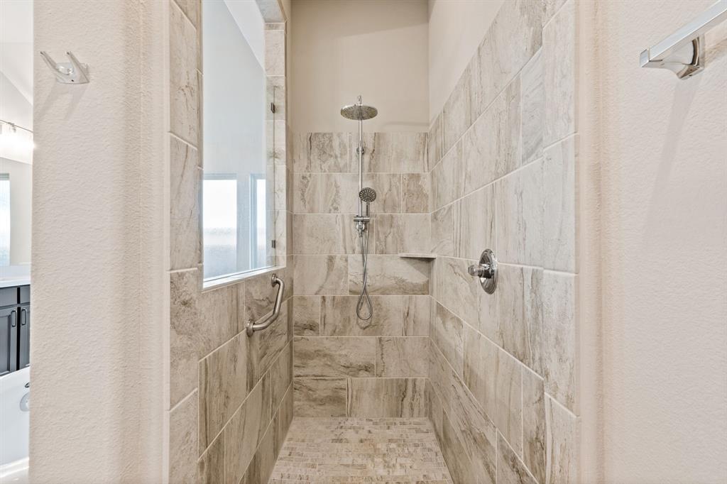 1314 Buttermere Street Forney, TX 75126 - Photo 14 of 32 a bathroom with a shower