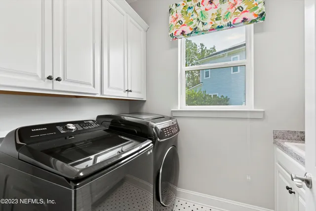 a close view of a stove and a microwave oven in a kitchen
