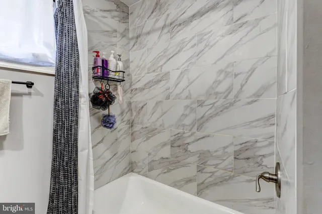 a bathroom with a bathtub