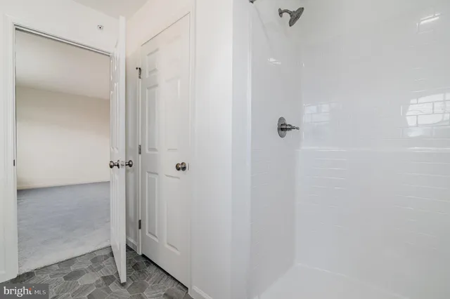 a view of a room with racks on the wall