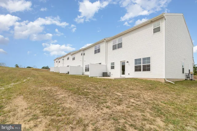 a picture of a bench in front of a door