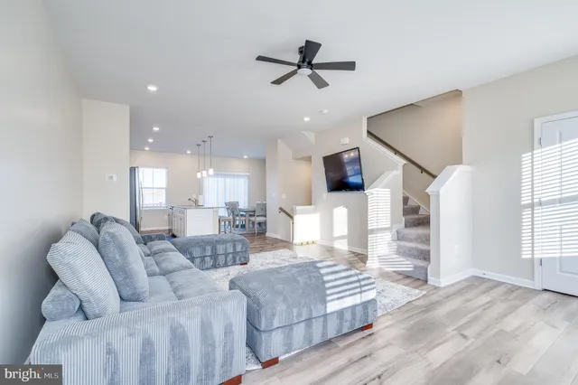 a bathroom with a sink a mirror and a window