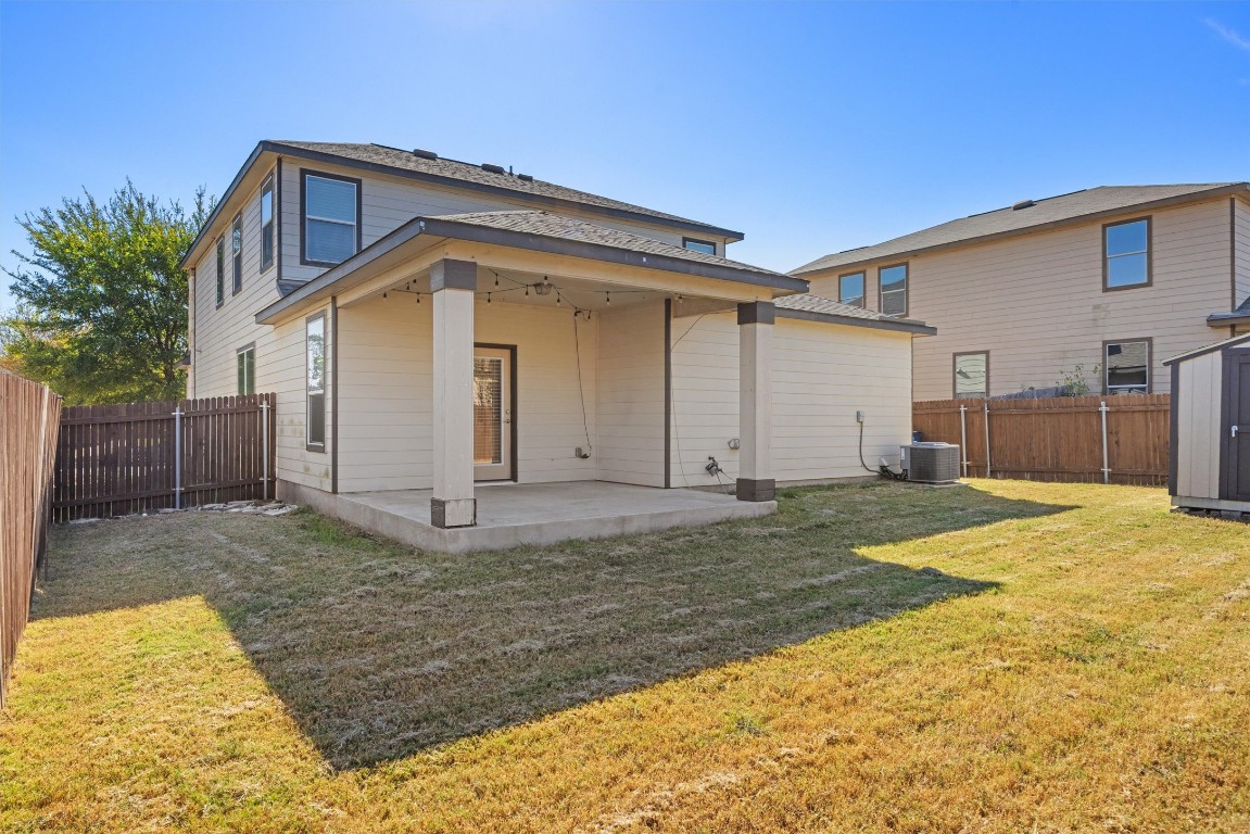 9100 Winter Haven Road Austin, TX 78747 - Photo 28 of 31 a view of a house with a yard