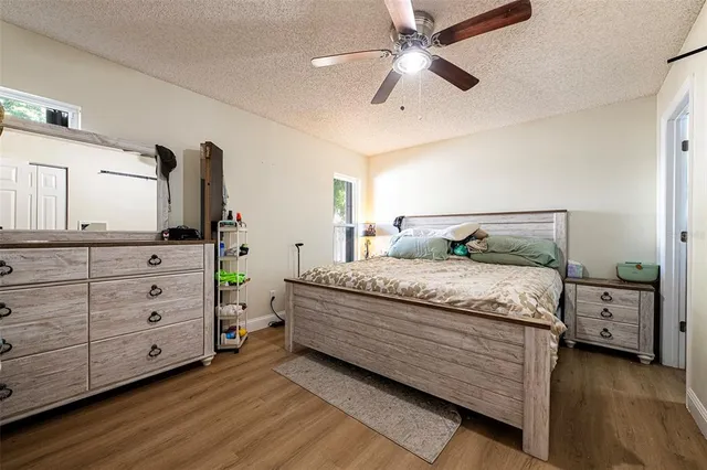 a bathroom with a sink a mirror and a toilet