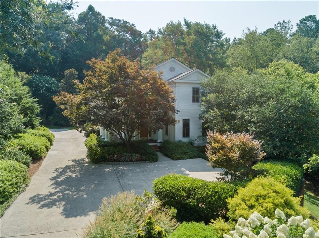 Nestled in mature landscaping