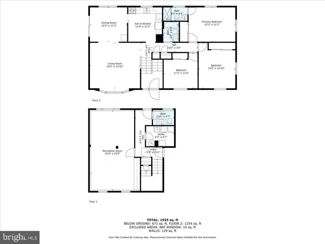 a picture of a bench in front of a wall