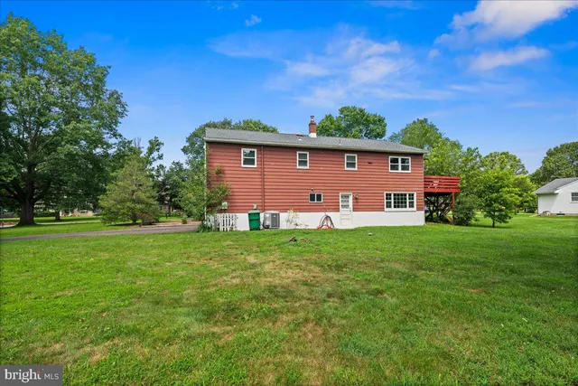 a view of a backyard with a garden