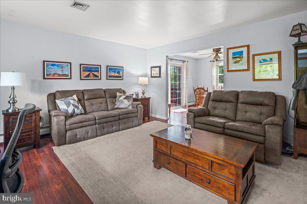 111 Howard Way Pennington, NJ 08534 - Photo 6 of 31 a living room with furniture and a couch