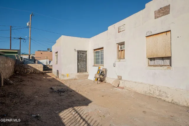a bed room with a bed and a couch