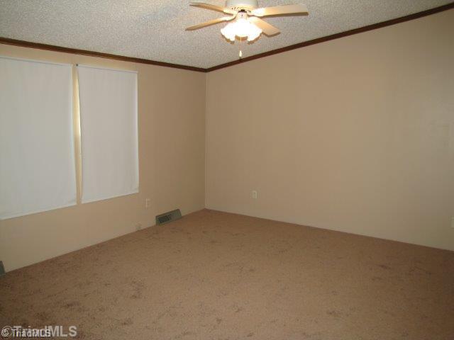 295 New Home Church Road Dobson, NC 27017 - Photo 12 of 16 Master Bedroom.