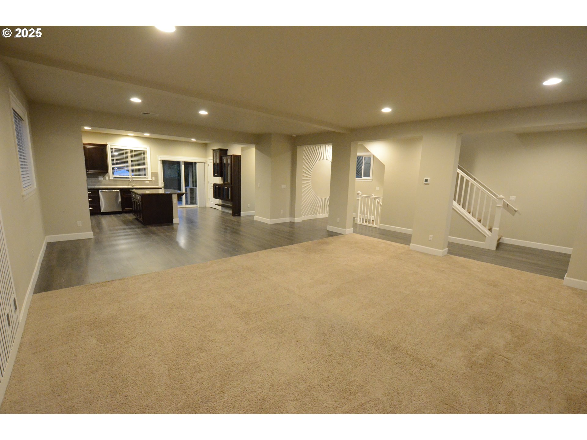15557 Southwest Wren Lane Beaverton, OR 97007 - Photo 18 of 28 a view of a living room and kitchen