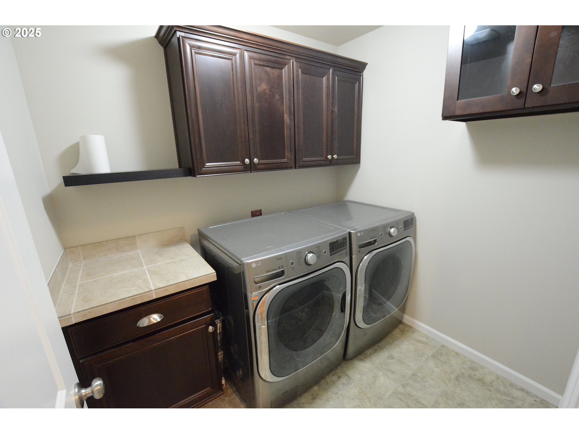15557 Southwest Wren Lane Beaverton, OR 97007 - Photo 19 of 28 a utility room with dryer and washer