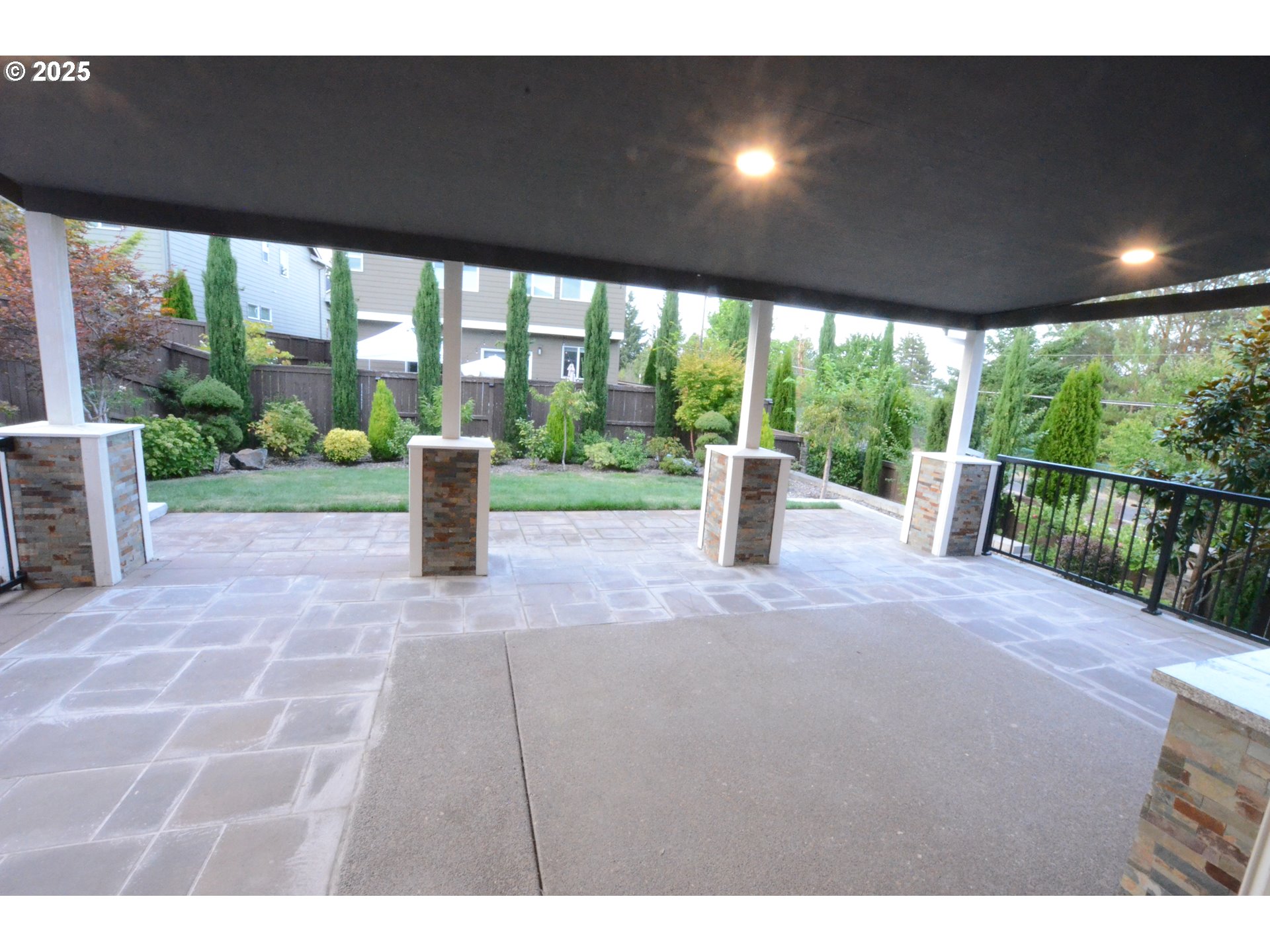 15557 Southwest Wren Lane Beaverton, OR 97007 - Photo 20 of 28 a view of a porch with furniture and garden