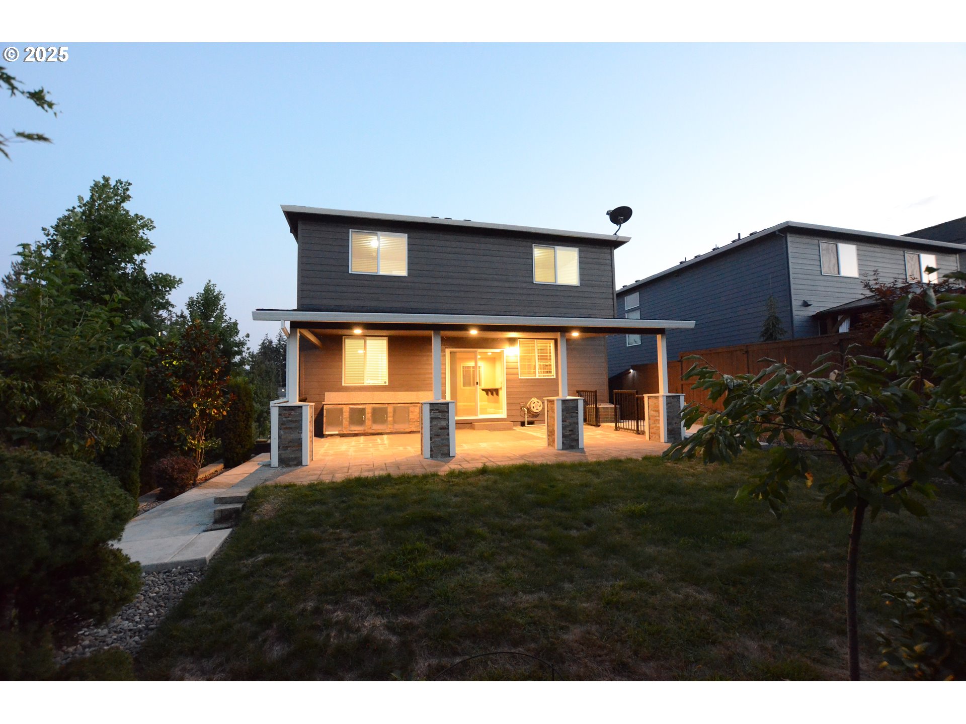15557 Southwest Wren Lane Beaverton, OR 97007 - Photo 22 of 28 a front view of a house with a yard