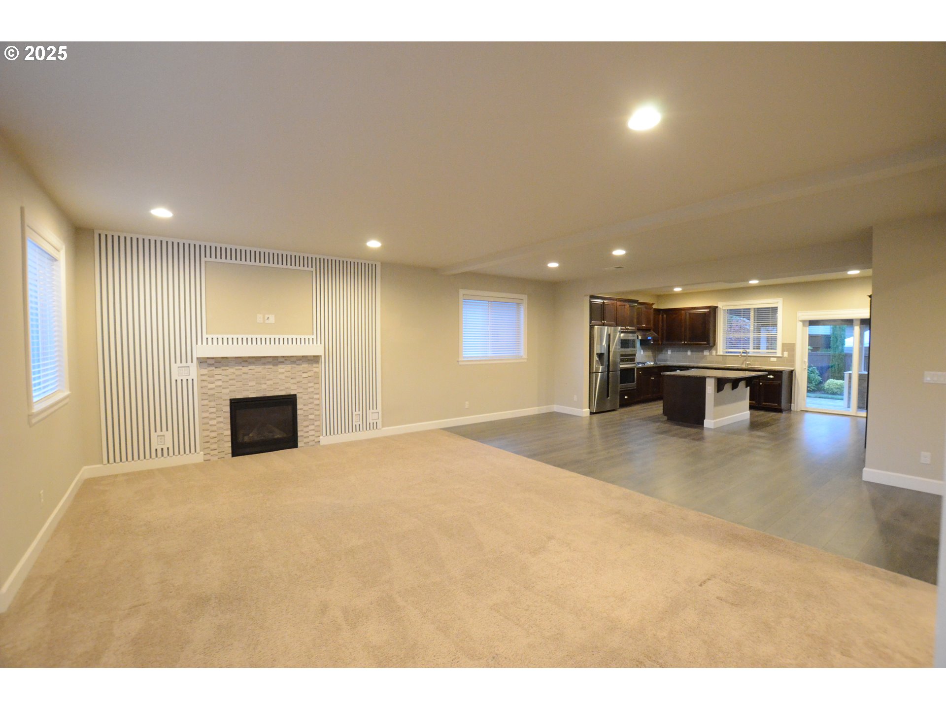 15557 Southwest Wren Lane Beaverton, OR 97007 - Photo 4 of 28 a view of an empty room and kitchen view