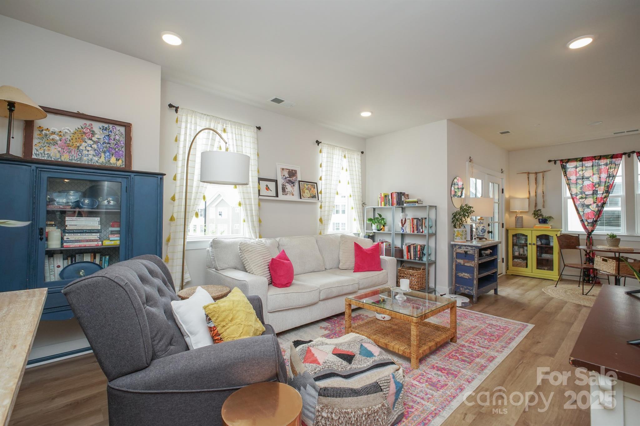 711 Beaty Street Davidson, NC 28036 - Photo 3 of 22 a living room with furniture and wooden floor